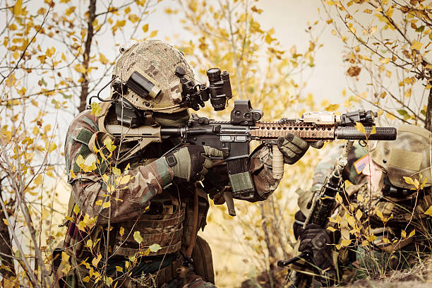 istock Soldiers team aiming at a target of weapons 474616830