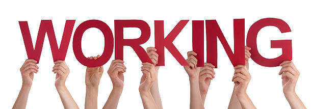 istock Many People Hands Hold Red Straight Word Working 474617304
