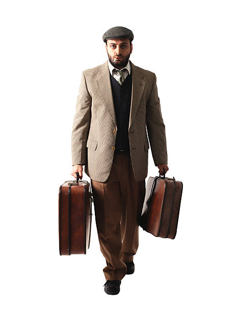 istock Emigrant man with the suitcases 474617468