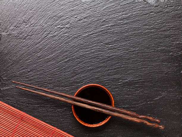 istock Japanese sushi chopsticks over soy sauce bowl 474618182