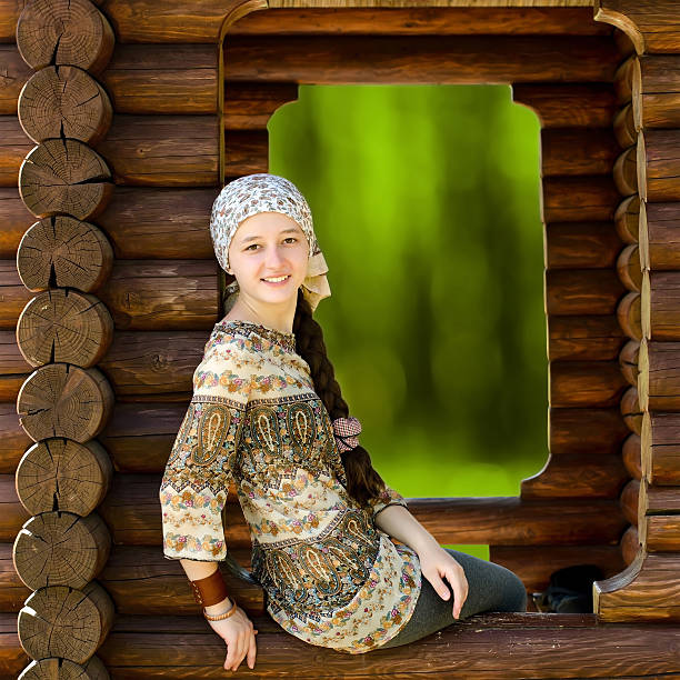 Young smiling woman in garden alcove
