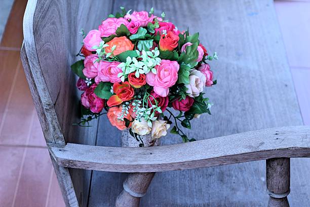 istock Artificial roses in a beautiful vase 474623942
