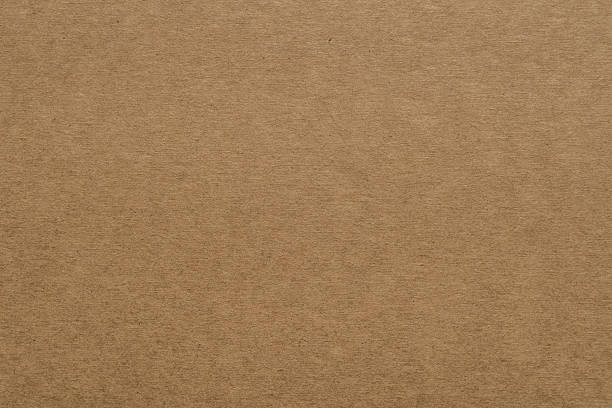 коричневый бумажный фон - brown paper стоковые фото и изображения