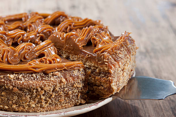 Cake with honey shortcakes, cream boiled condensed milk stock photo