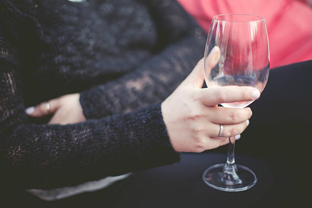 istock Woman Holding Wine Glass 474631116