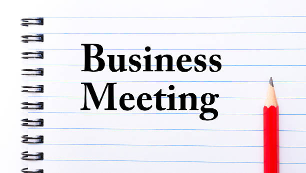 istock Business Meeting Text written on notebook page 474632484