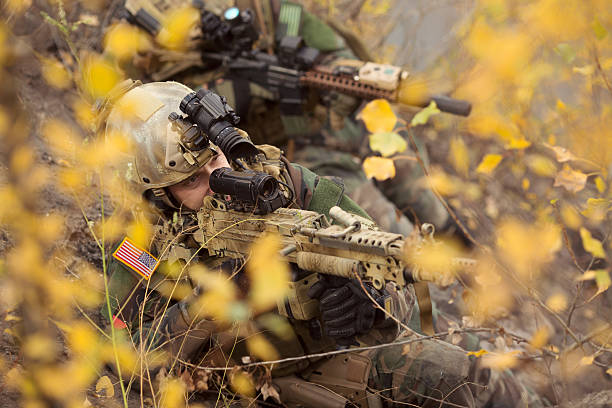 istock U.S. soldiers team aiming at a target of weapons 474640854
