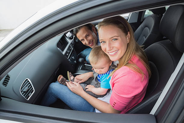 istock Parents and baby on a drive 474642184