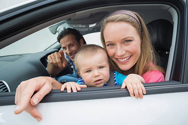 istock Parents and baby on a drive 474642190