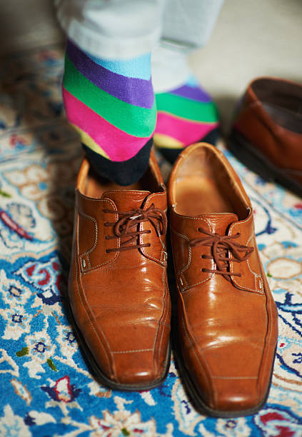 istock Socks and shoes that speak louder than words 474644578