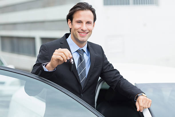 istock Businessman holding key 474644624