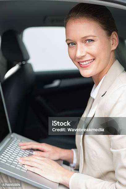 Businesswoman Working Stock Photo - Download Image Now - 20-29 Years, 2015, 25-29 Years