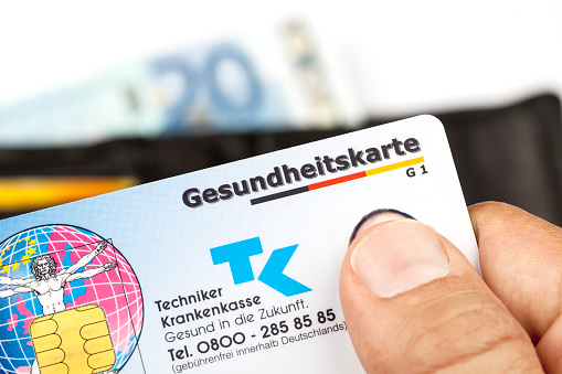 Wiesbaden, Germany - May 20, 2015: Close-up of a German Health Insurance Card. The pictured card is issued by Techniker Krankenkasse. Techniker Krankenkasse (TK) with app. 9.3 million insurants is one of the largest German National Health Insurance companies.