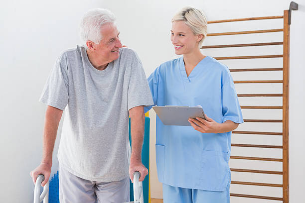 istock Therapist encouraging senior man 474645560