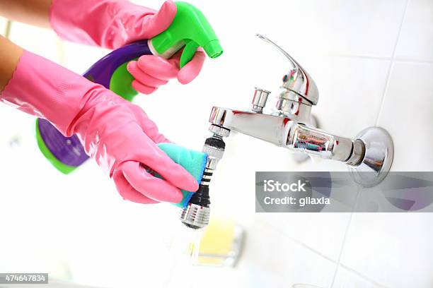 Cleaning Bathroom Faucet Stock Photo - Download Image Now - 2015, Appliance, Bathroom