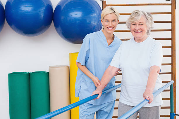 istock Senior woman and therapist smiling at camera 474648072