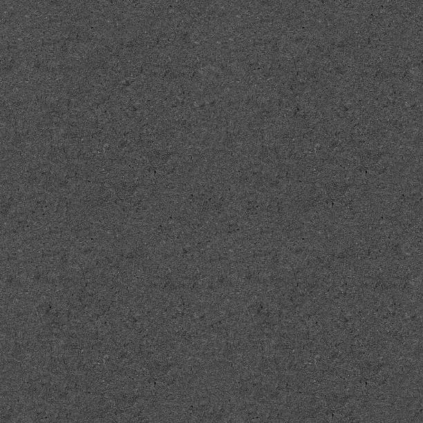 istock Seamless dark gray with black spots tiles texture 474648504