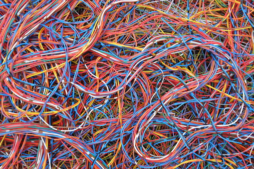 Colored telecommunication cables and wires as background