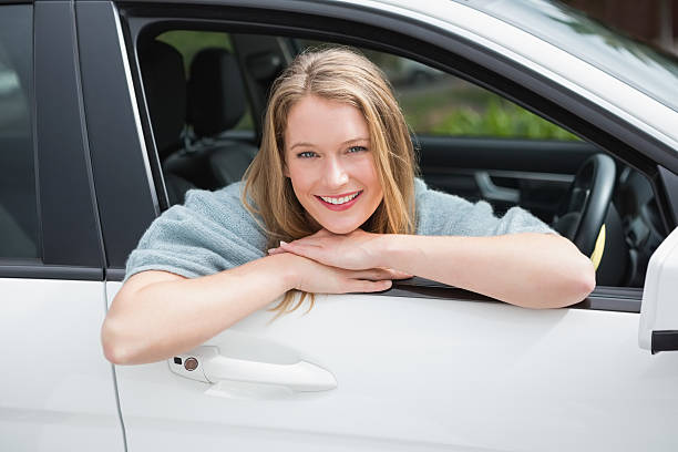 istock Young woman smiling at camera 474652902