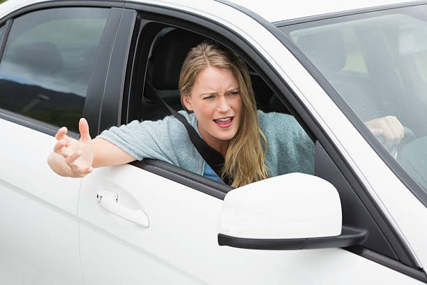istock Young woman experiencing road rage 474652970