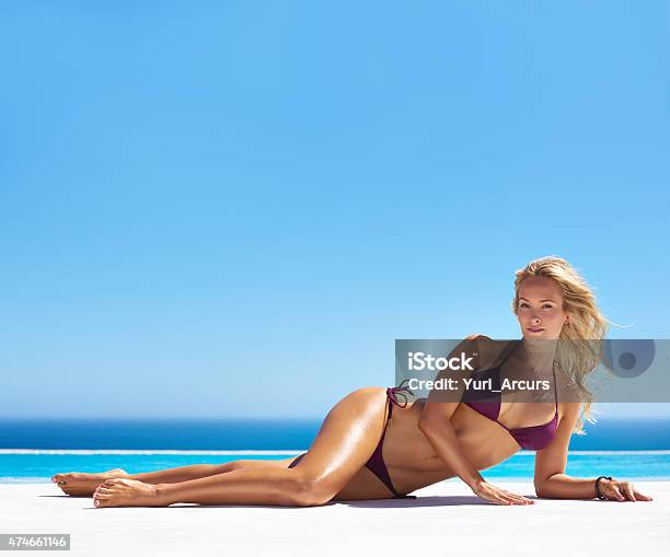 Getting A Gorgeously Golden Tan Stock Photo - Download Image Now - One Woman Only, Sensuality, Swimming Pool