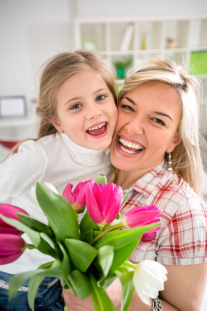 istock mom with her daughter on Mother's Day 474664322