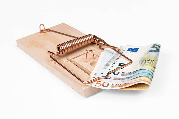 Risk of investment Mouse trap with Euro bills isolated over white with clipping path. rich mouse stock pictures, royalty-free photos & images