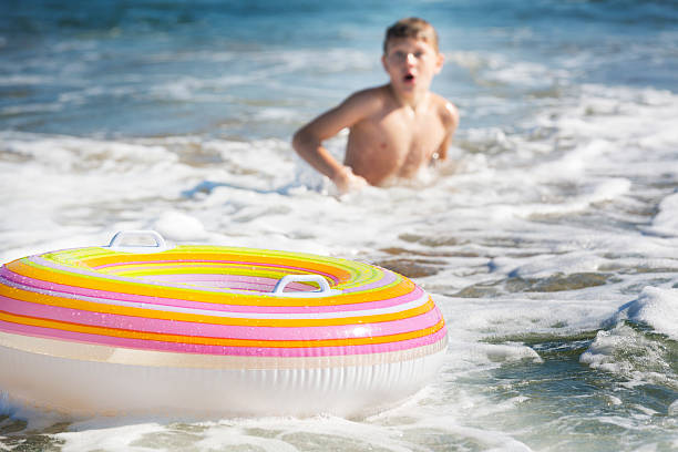 Boy Enjoys a Day in the Surf