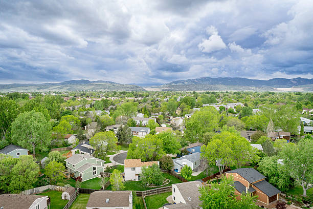 aerial view of resdential area and foothills aerial view of resdential area and foothills of Rocky Mountains at springtime - Fort Collins, Colorado front range mountain range stock pictures, royalty-free photos & images