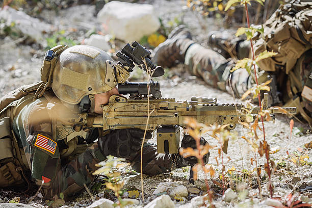 istock solders aiming at a target of weapons 474668038