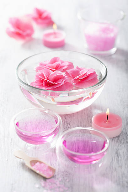 istock pink flower salt and essential oil for spa 474670215