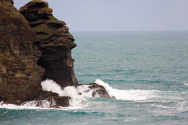 istock Waves clashing against the rocks 474671818