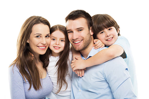 jovem família com duas crianças a - couple indoors studio shot horizontal imagens e fotografias de stock