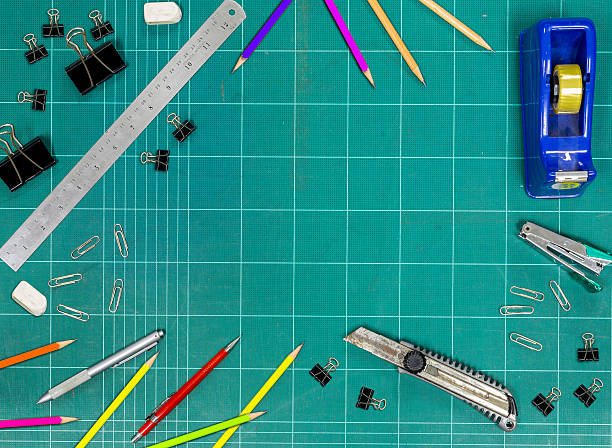 istock Frame with  office accessories on the cutting mat 474679128