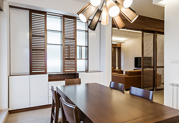 istock Dining room interior in modern bright apartment 474683026