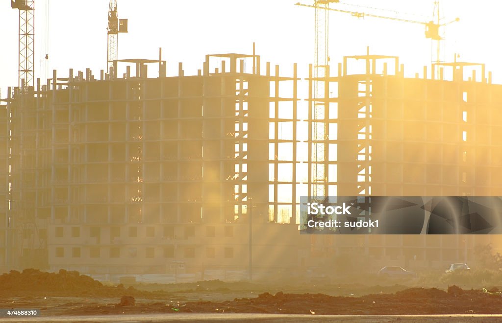 Construction of a large building in the sunset 2015 Stock Photo