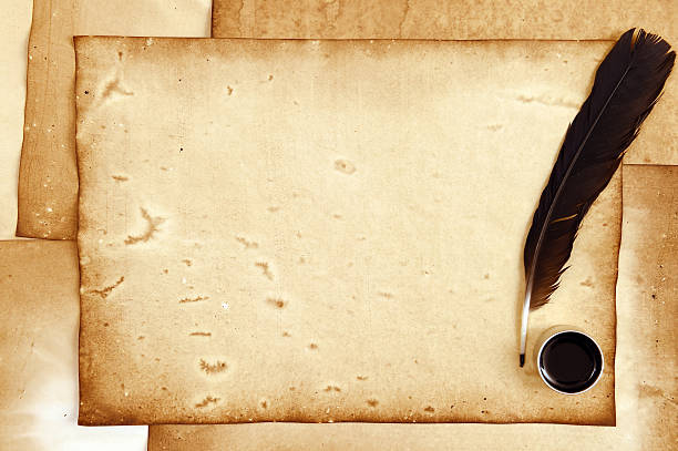 istock old paper with feather and ink 474689068