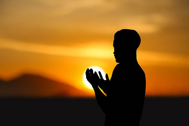 beten - applauding contemplation praying arms outstretched stock-fotos und bilder