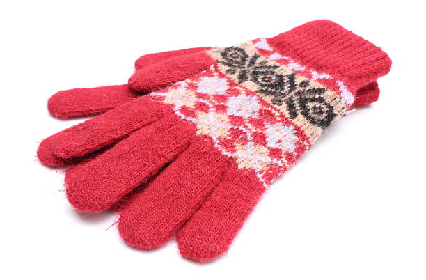 istock Pair of red woolen gloves on white background 474693627