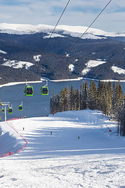 istock Ski slope above the lake 474694735