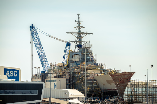 Bath, USA - October 8, 2021. Navy battle ship under maintenance in yard at Bath, Maine, USA