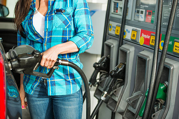 istock Gas nozzle at petrol station 474698513