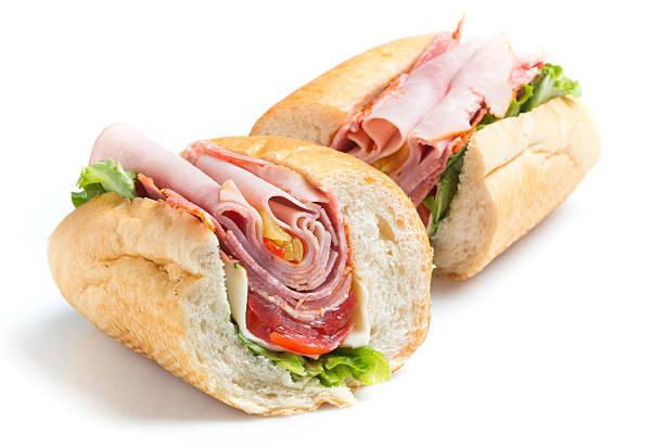 Italian Submarine Sandwich Italian Submarine Sandwich on White Background submarine sandwich photos stock pictures, royalty-free photos & images