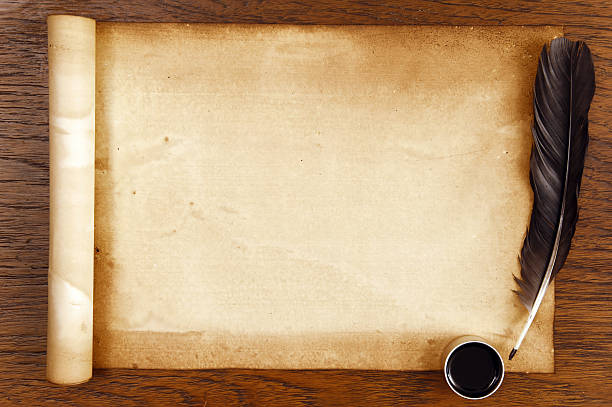 istock old paper on brown wood texture with feather and ink 474700838