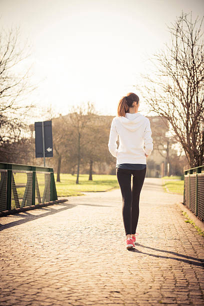 istock Woman jogging in the nature 474701445