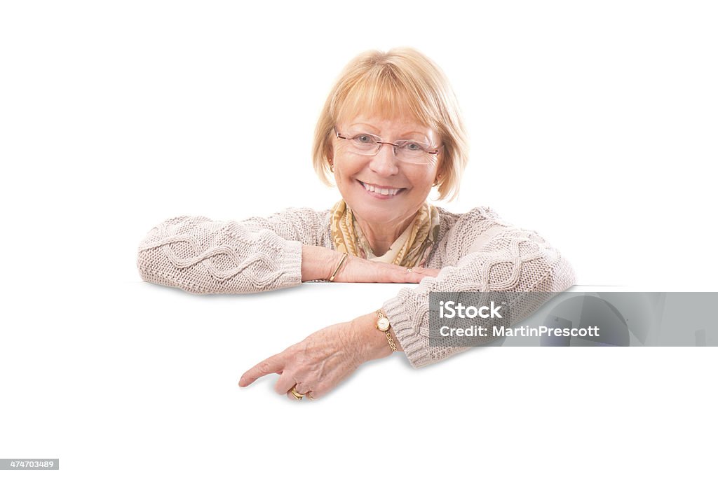 senior female with blank banner 70-79 Years Stock Photo