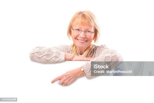 Senior Female With Blank Banner Stock Photo - Download Image Now - 70-79 Years, Active Seniors, Adult