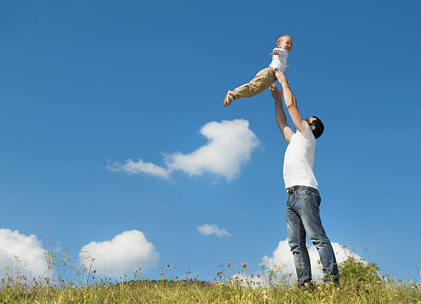 istock Happy family in nature 474704203