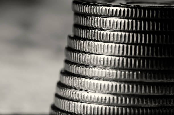 Stack of coins black and white macro stock photo