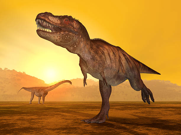 istock Tyrannosaurus Rex and Puertasaurus 474705701